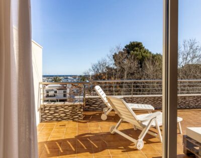 PORT DE LLANÇÀ 37 – Ático con terraza y vistas al mar