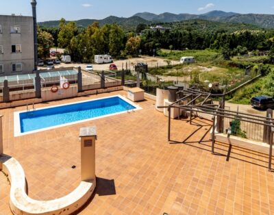 PORT DE LLANÇÀ 43 – Ático con piscina comunitaria